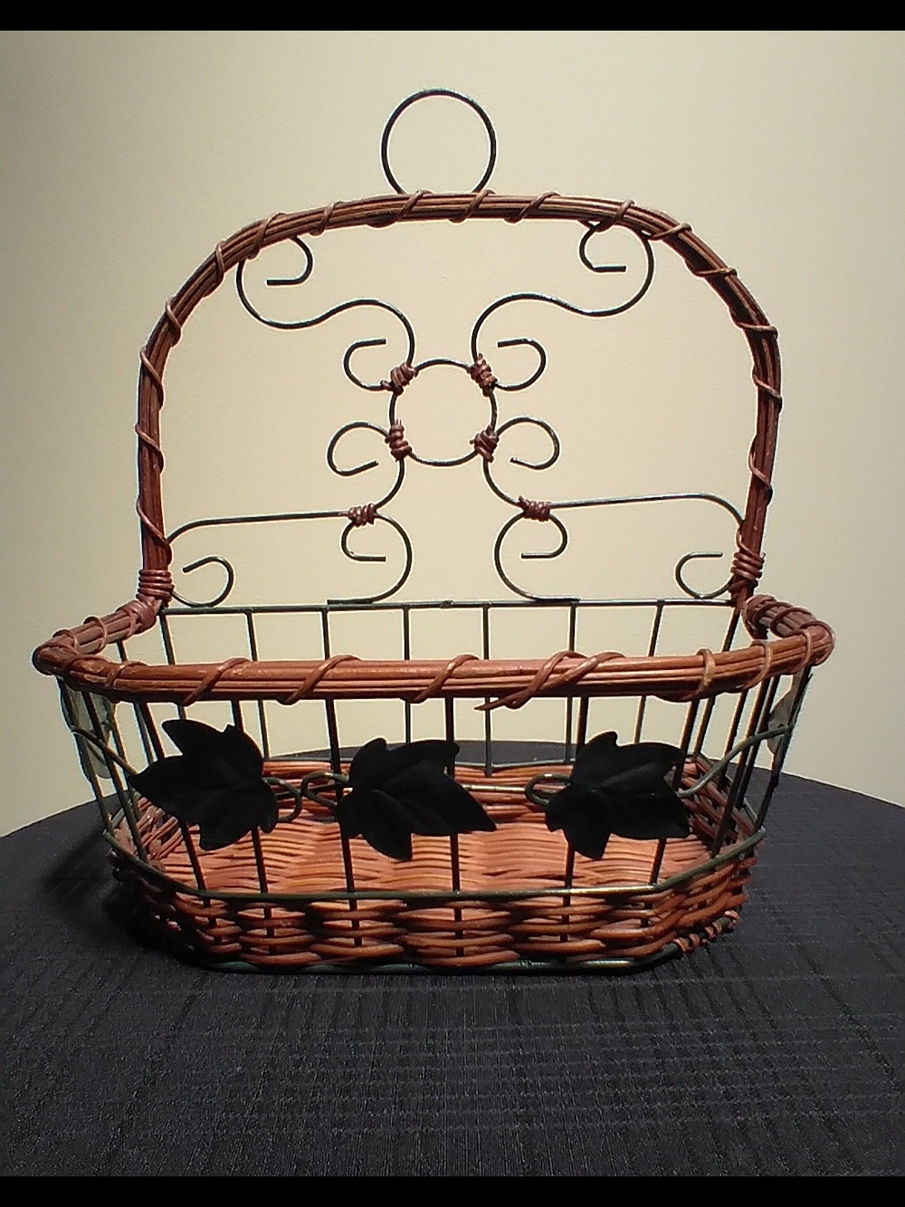 Wicker & Green Metal Wall Basket with Leaf Accents